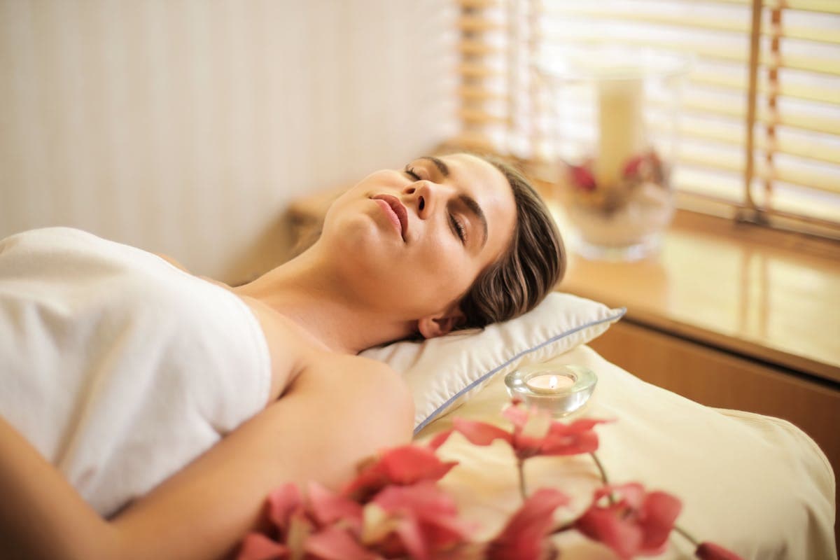 Peaceful spa treatment room with natural elements